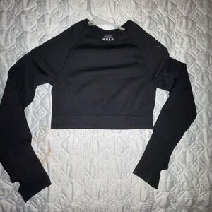 Black long sleeve cropped athletic yoga top 
Size: Small S NWOT